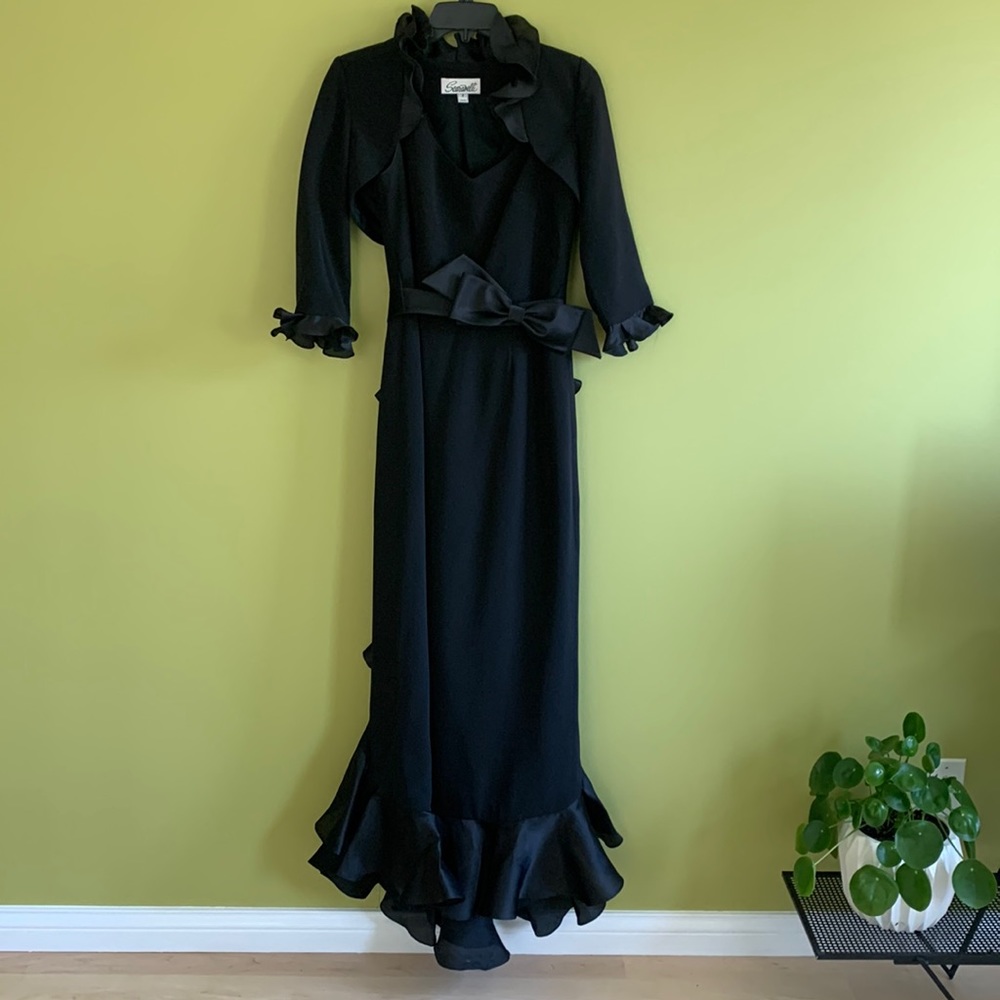 Gorgeous black formal gown with ruffles, bow belt and bolero jacket.